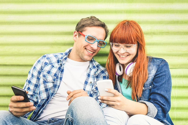 young-couple-phones